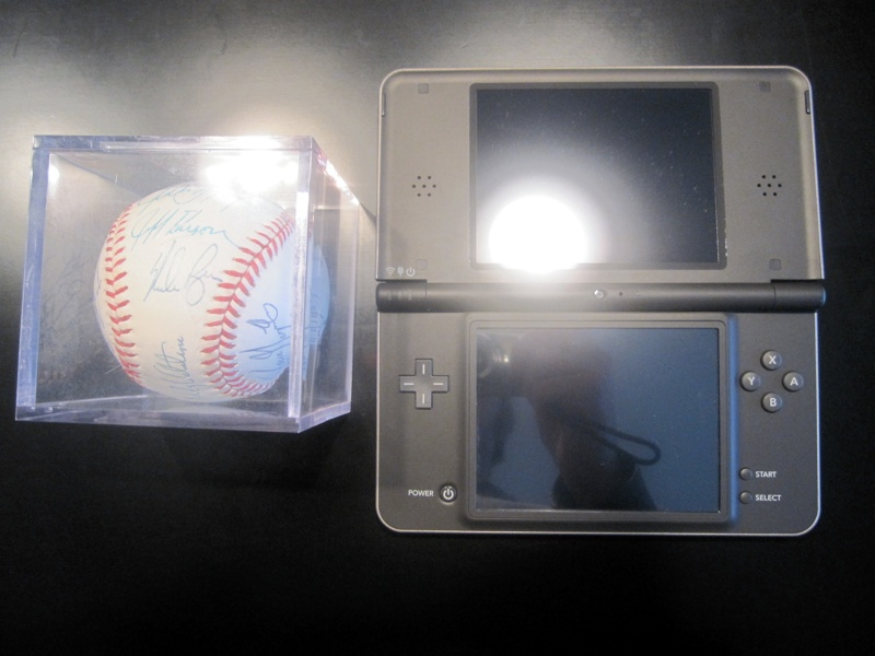 Illustration for article titled Is The DSi LL Bigger Than Uncharted 2, Nolan Ryan's Autograph, A Can of Beer?